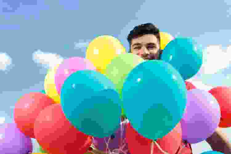 surrounded by balloons