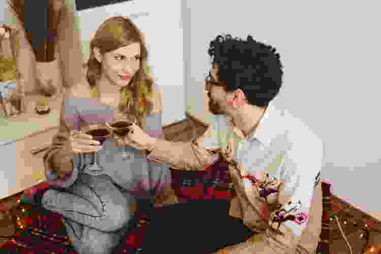 couple drinking cocktail at home