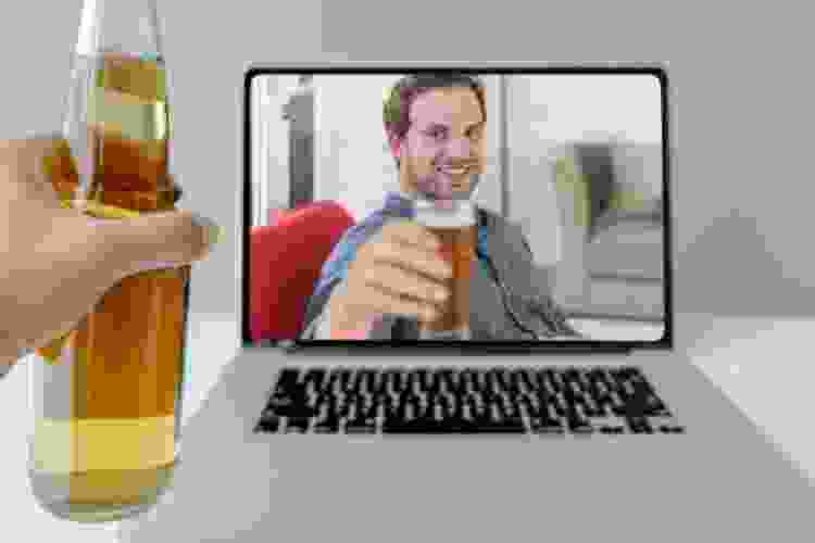 cheers with beer over video call