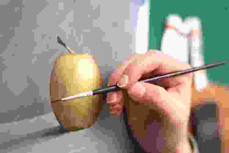 hand painting green apple on canvas