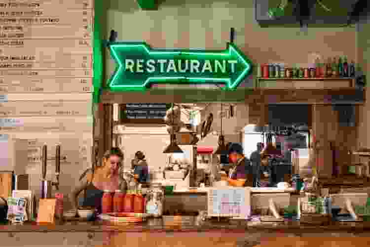 Antique taco restaurant in Chicago with glowing neon sign