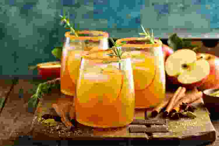 This fruity Thanksgiving cocktail is made of apples and oranges.