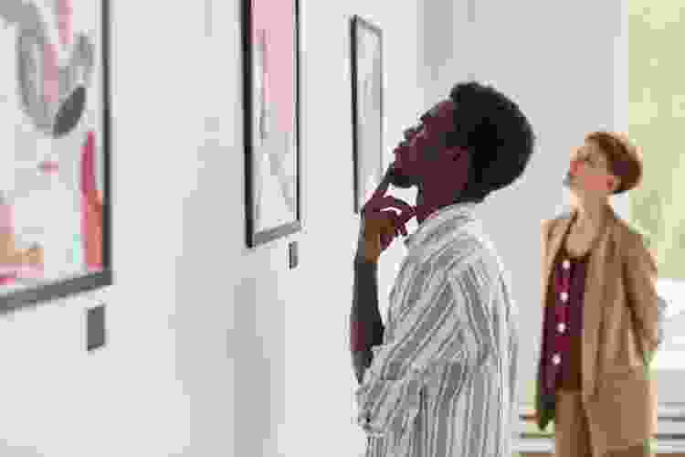 couple browsing art in gallery