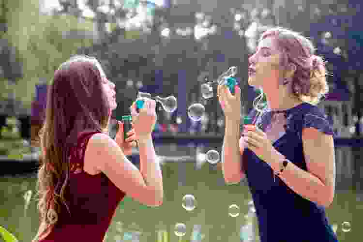 Blowing bubbles at a wedding