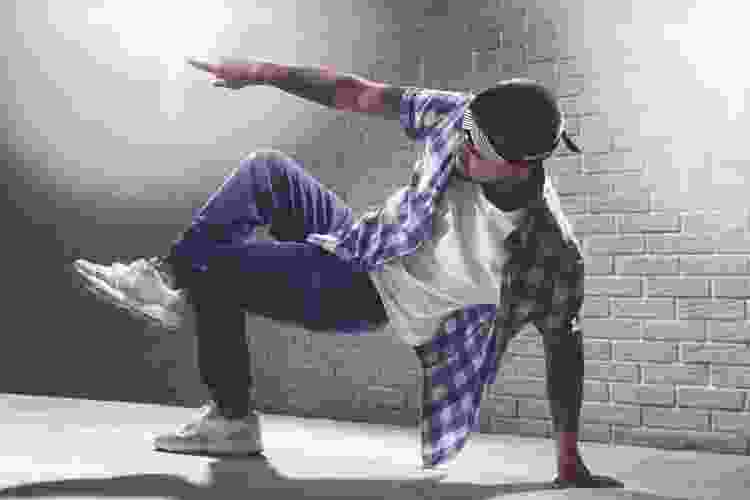 guy breakdancing on dance floor