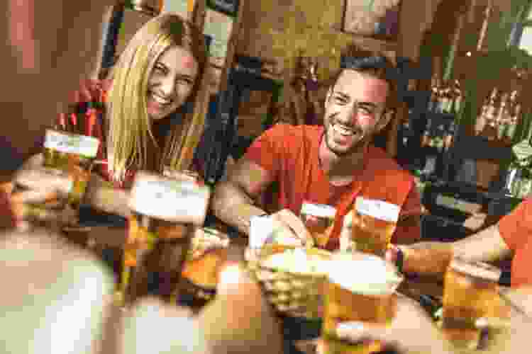 coworkers enjoying beers at a brewery