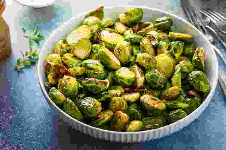 bowl of roasted Brussels sprouts for Thanksgiving food ideas for a crowd