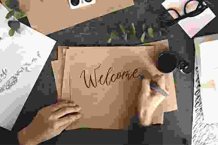 hand writing calligraphy welcome sign