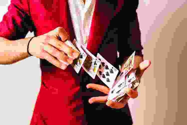 dealer shuffling cards