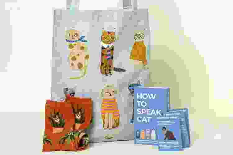 cat lovers gift set with cat socks, books and bags