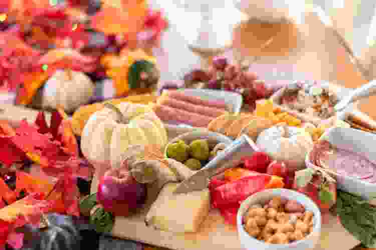 Use a Charcuterie board as Thanksgiving table decor.