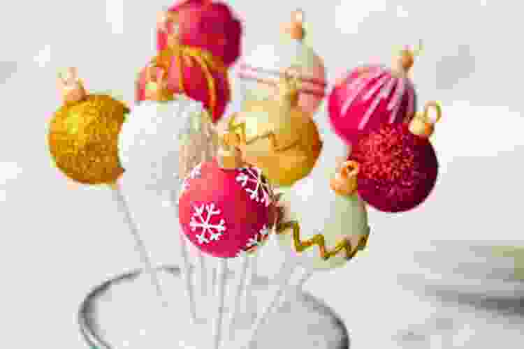 cake pops shaped and decorated like Christmas ornaments