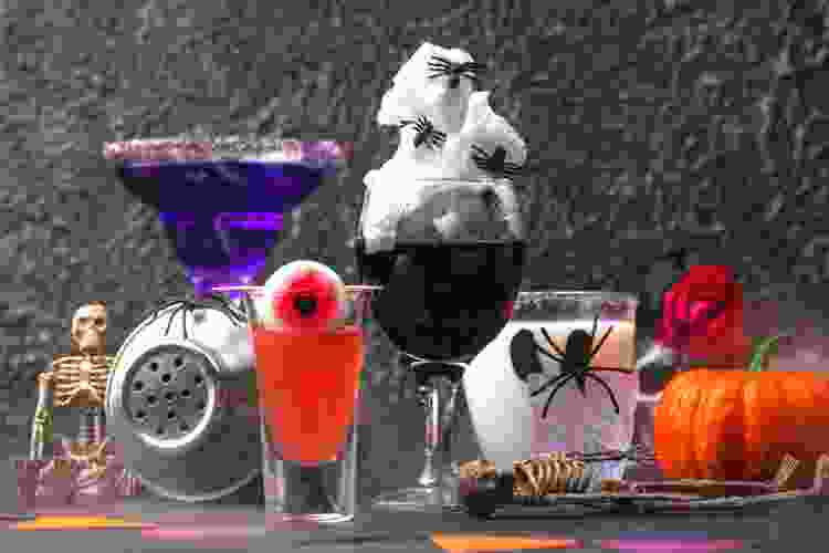 Halloween themed cocktails with spiders and eyeballs