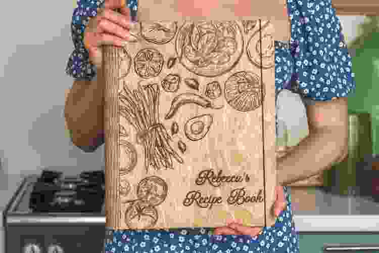 wooden cookbook with name etched in the cover