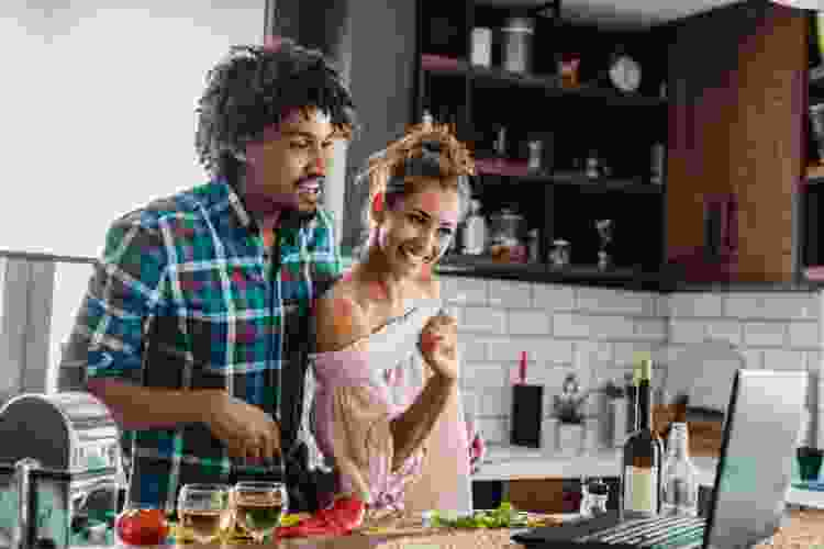 couple cooking together at home