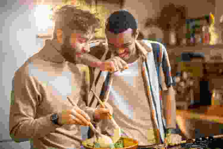 couple cooking in their home kitchen together