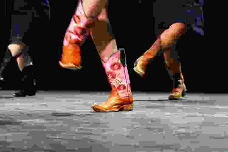 cowboy boots dancing on dance floor