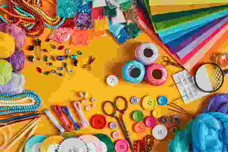 collection of craft supplies spread on table