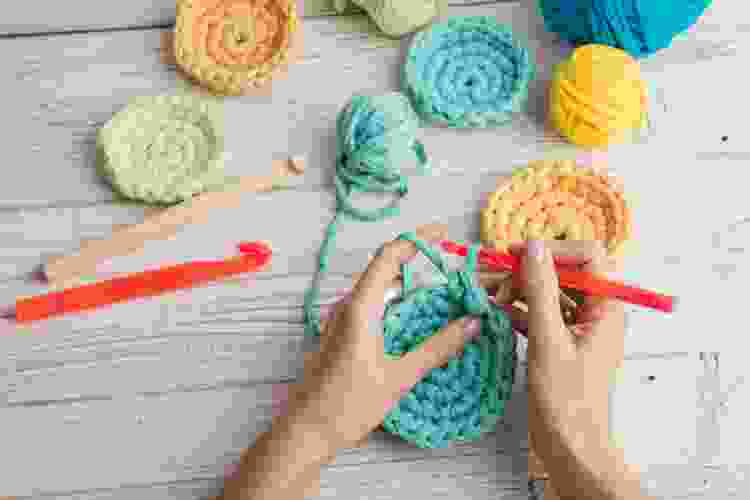 hands crocheting 