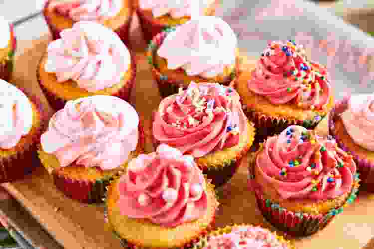 assortment of pink cupcakes