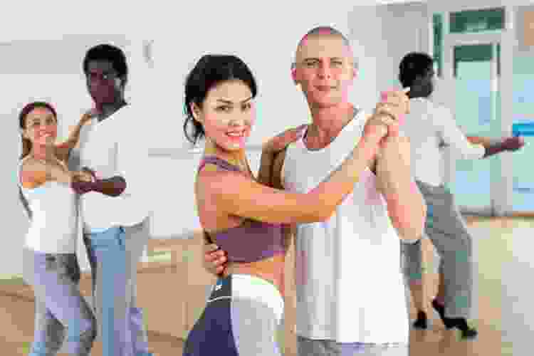 couples dancing together in dance studio