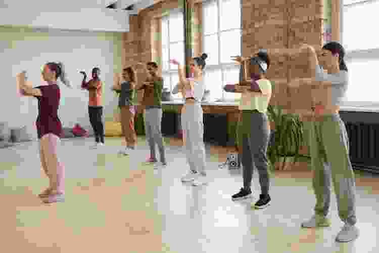 group learning to dance in studio