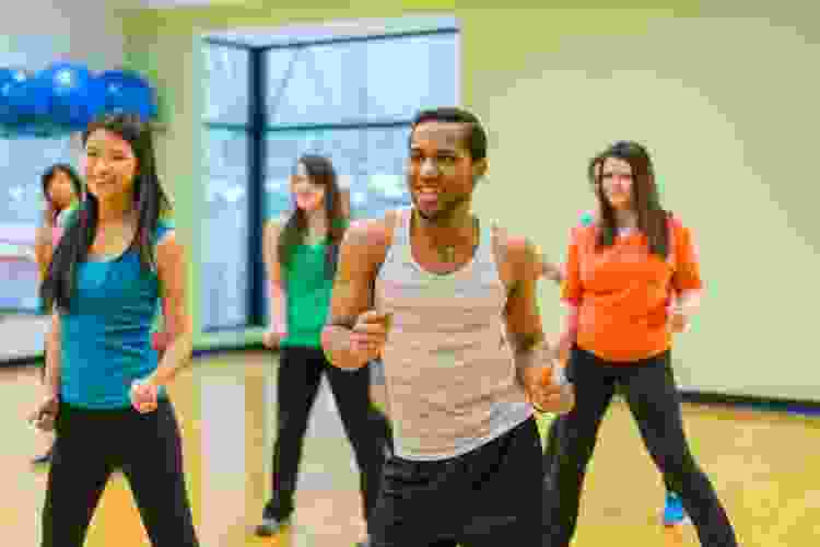 group of people dancing in dance class