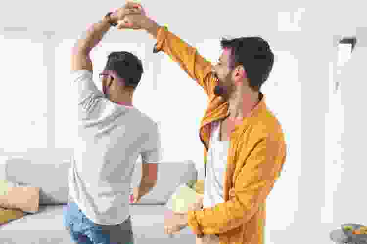 two men dancing with turns