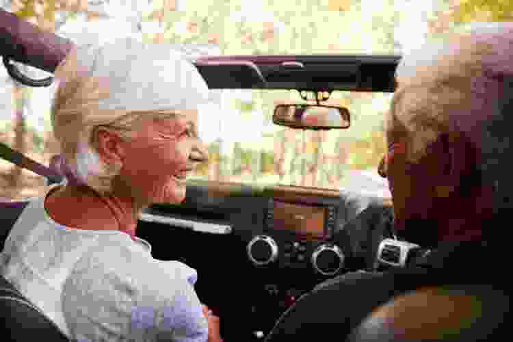 older couple taking a drive together