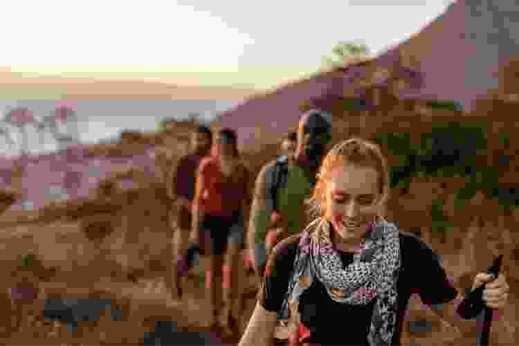 group of hikers in the desert mountains