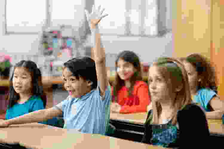 Diverse kids sitting in a class