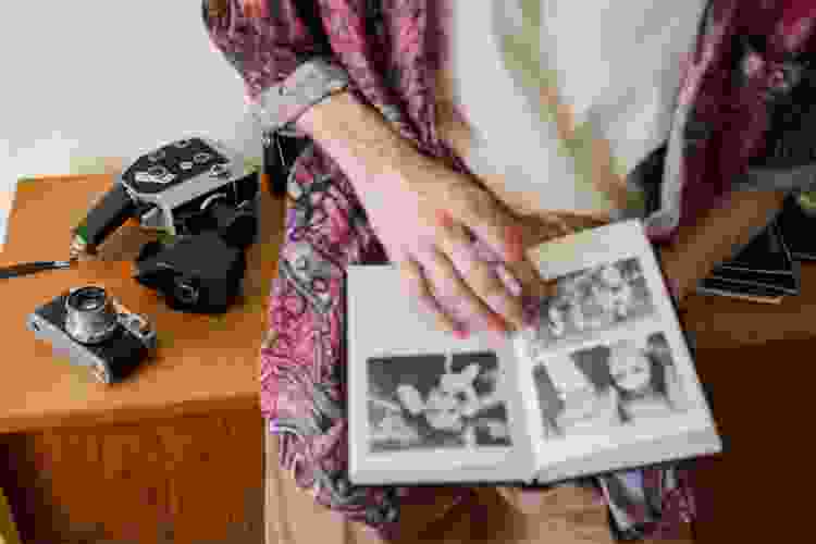 placing film photos in photo book 