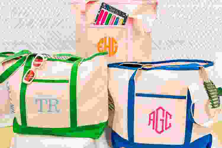 group of colorful monogrammed tote bags