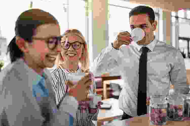 Emploees drinking coffee together