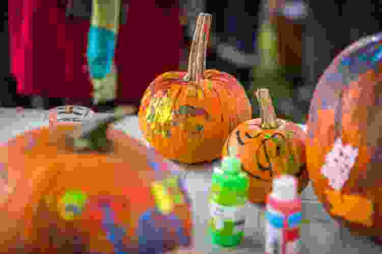 finger paint pumpkin carving idea for kids