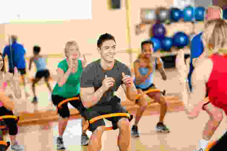 group of people exercising in a fitness class