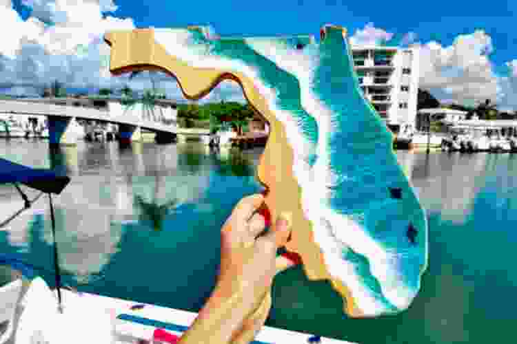 resin beach serving board in the shape of Florida