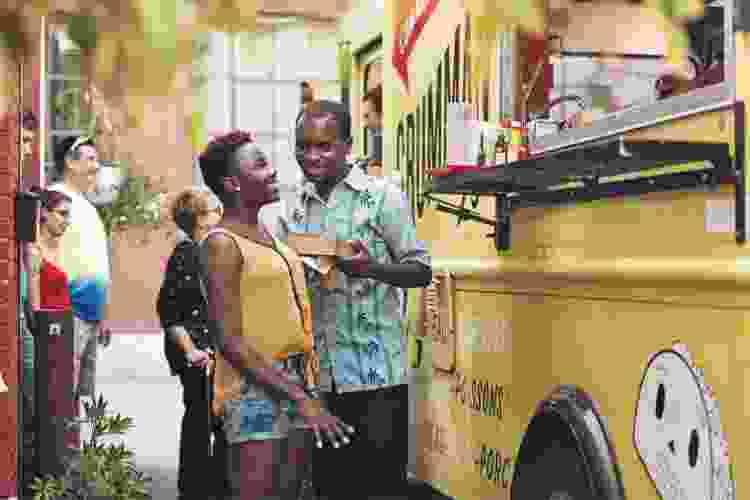 couple ordering food at food truck