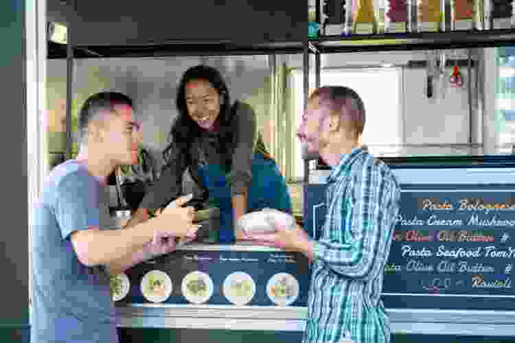 friends ordering food at food truck