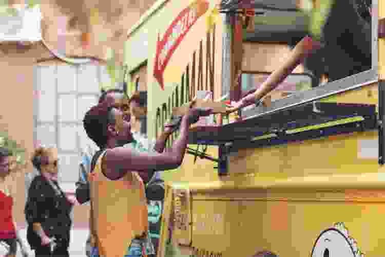 couple ordering food at food truck