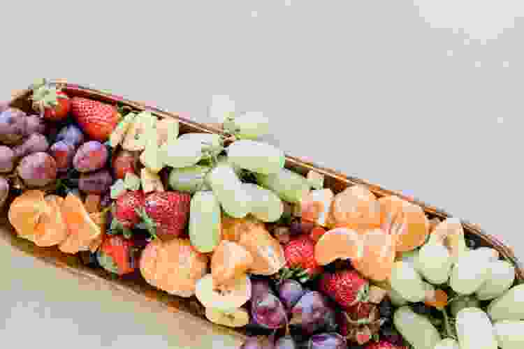 colorful fruit platter arrangement for dinner party food