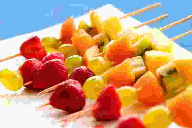 A healthy wedding food idea is to serve fruit skewers.