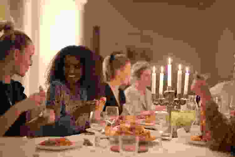 women enjoying fancy dinner together