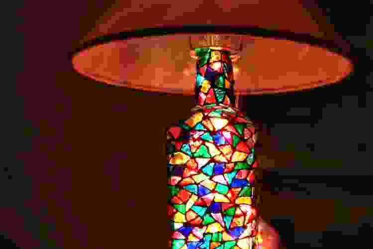 stained glass painted lamp glowing in the night