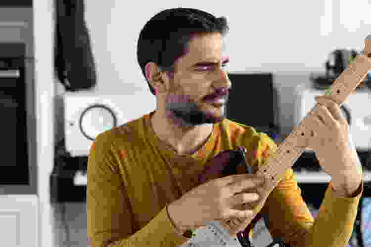 man playing guitar