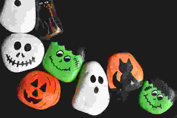 Halloween rocks painted with monster and ghost faces