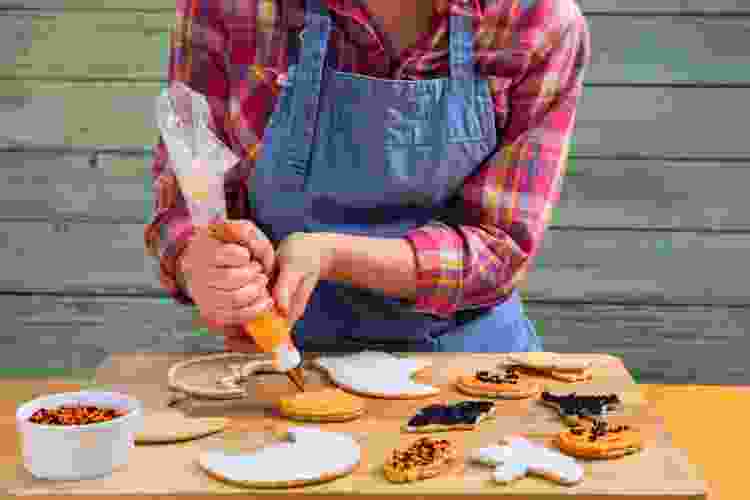 decorating Halloween-themed cookies