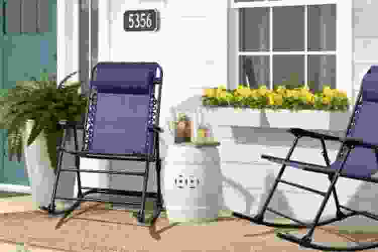 two folding rocking chairs on front porch