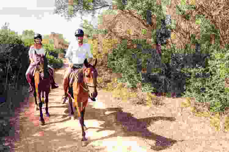 couple riding horseback