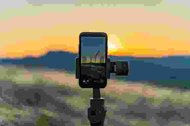 iPhone on a tripod at sunset